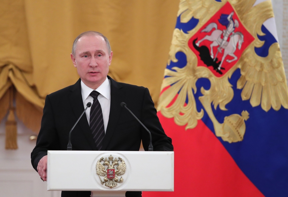 Russian President Vladimir Putin said Friday that Moscow would not eject American diplomats in response to what he described as "provocation aimed at further undermining Russian-American relations."