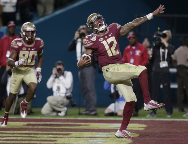 Florida State quarterback Deondre Francois celebrates after scoring a touchdown in the second half of the Orange Bowl on Friday night in Miami Gardens, Fla. Francois threw the game-winning touchdown pass with 36 seconds left in the fourth quarter.