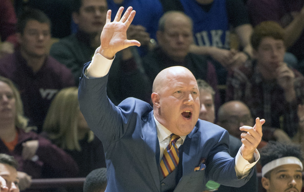 Virginia Tech head coach Buzz Williams yells to his players during the first half of an NCAA game Saturday at Cassell Coliseum in Blacksburg, Va. Tech won 89-75. (AP Photo/Don Petersen)
