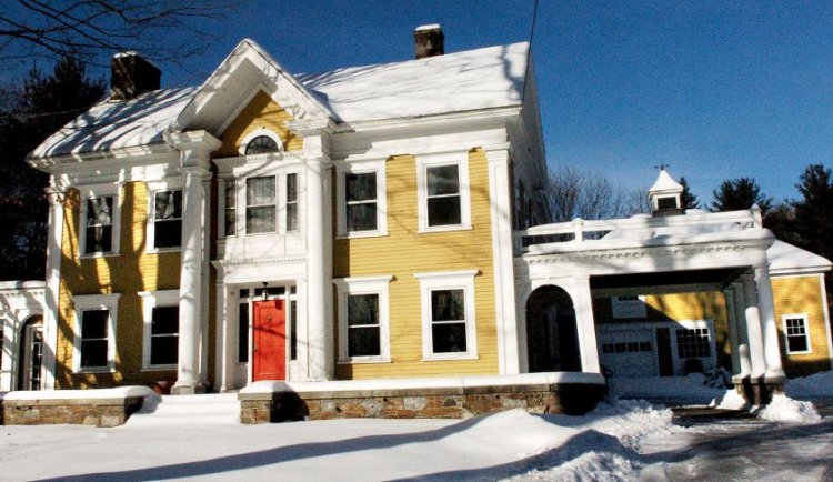 This 13-room Greek Revival home and land at 400 Water St. in Skowhegan, owned recently by attorney Dale Thistle, will be put up for auction Wednesday.