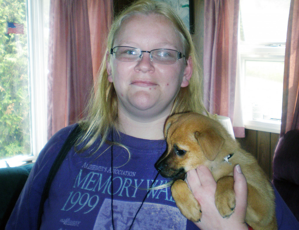 Michele Breault with her dog Lucky when we was a puppy. 