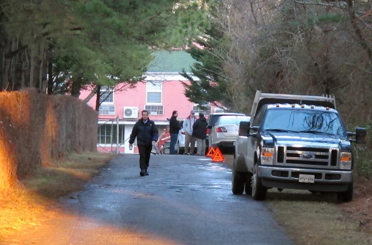 U.S. State Department personnel block the entrance to the grounds of a riverfront compound near Centreville, Maryland, that has been used by Russian  diplomats for years. Sanctions announced Thursday by President Barack Obama include shuttering the compound. <em>Associated Press/Brian Witte</em>