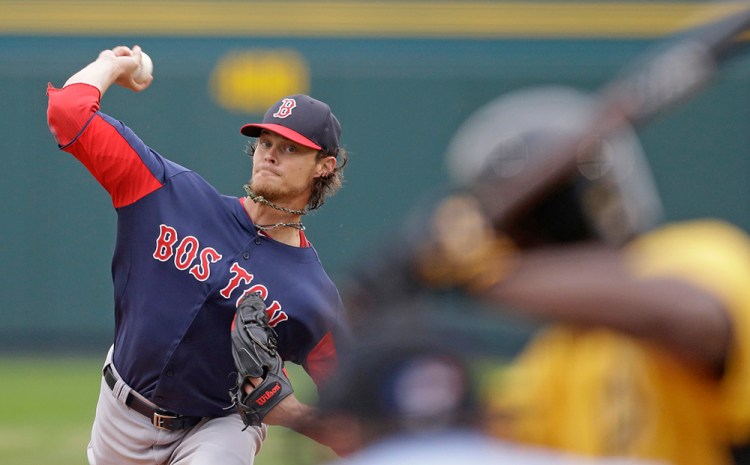 Clay Buchholz throws during the first inning of a spring training game against the Pittsburgh Pirates on March 18, 2013 in Bradenton, Fla.  <em>Associated Press/Carlos Osorio</em>