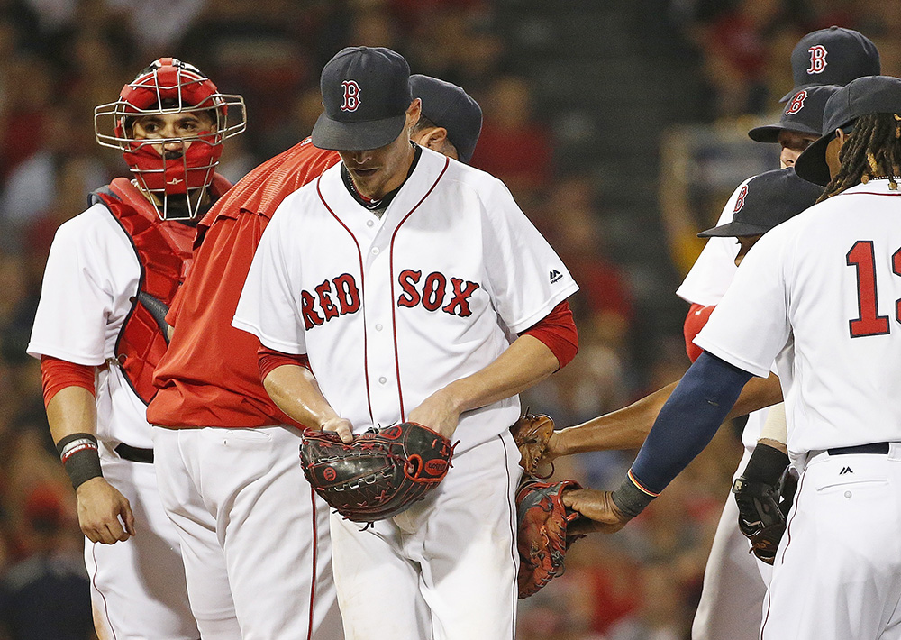 Clay Buchholz leaves the mound after being taken out of a game in the fifth inning against the Arizona Diamondbacks on Aug. 13, 2016.  <em>Associated Press/Michael Dwyer</em>