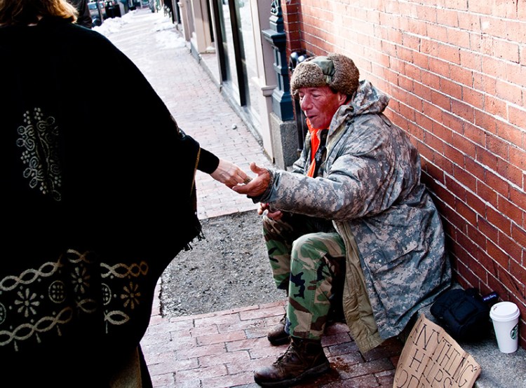 Ray Richard who was a chatty, friendly panhandler seen here in 2013 outside of Starbucks on Exchange Street.