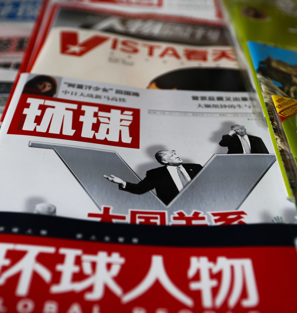 A magazine's front-page showing Donald Trump and the headline "Relations of Great Powers" is displayed at a Beijing newsstand Dec. 13. The U.S. and China face some common challenges.
