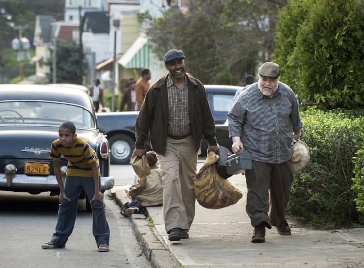 Denzel Washington and Stephen McKinley Henderson portray Pittsburgh garbage collectors in "Fences."