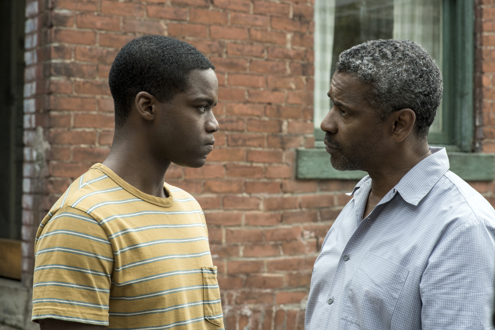 This image released by Paramount Pictures shows Jovan Adepo, left, and Denzel Washington in a scene from "Fences." (David Lee/Paramount Pictures via AP)
