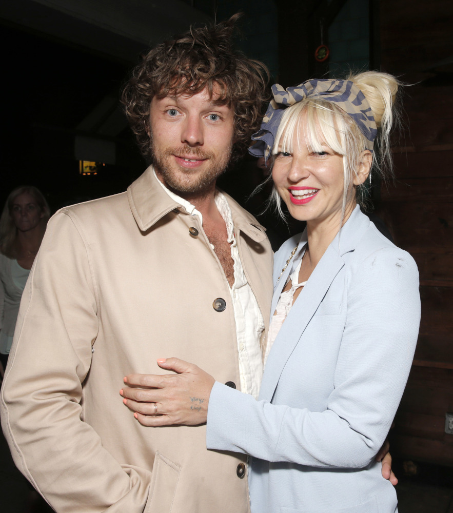 Filmmaker Erik Anders Lang, left, and singer Sia attend a party after the premiere of "The One I Love" in Los Angeles in 2014.