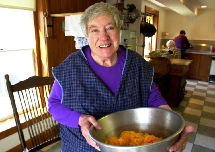 Sister Frances Carr, an elder at the Sabbathday Lake Shaker Village, preparing dinner in the community's kitchen in April of 2000. She died Monday at 89.