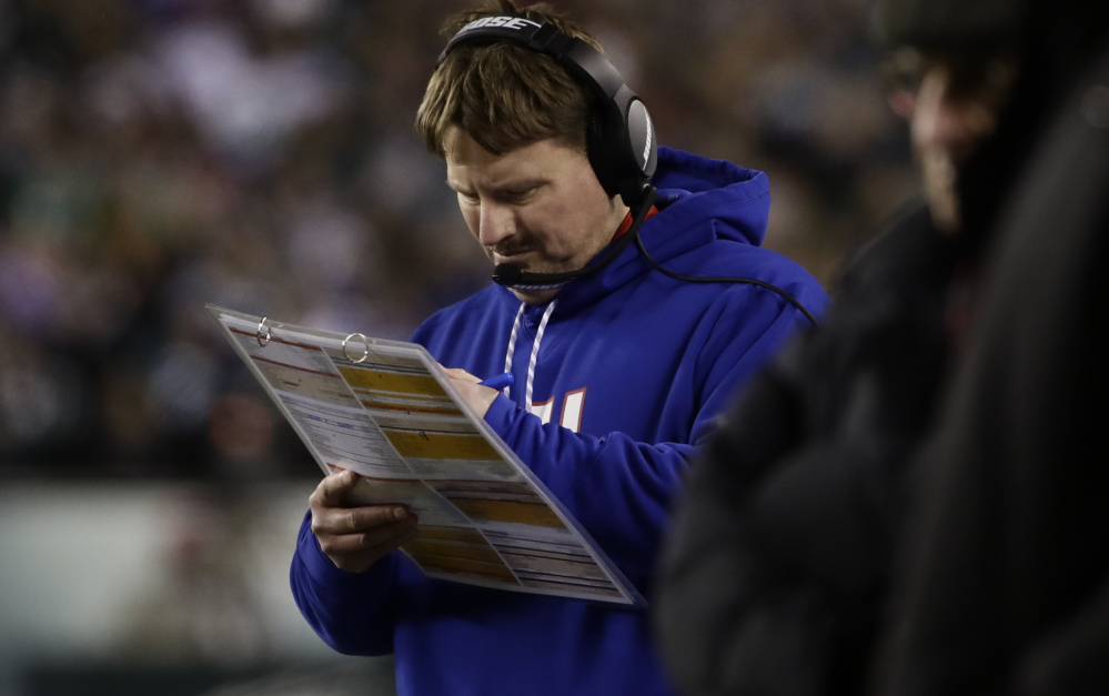 Ben McAdoo was Aaron Rodgers' quarterback coach in Green Bay for two seasons. On Sunday, the Giants' coach must find a way to stop the Packers' QB when they face off.
