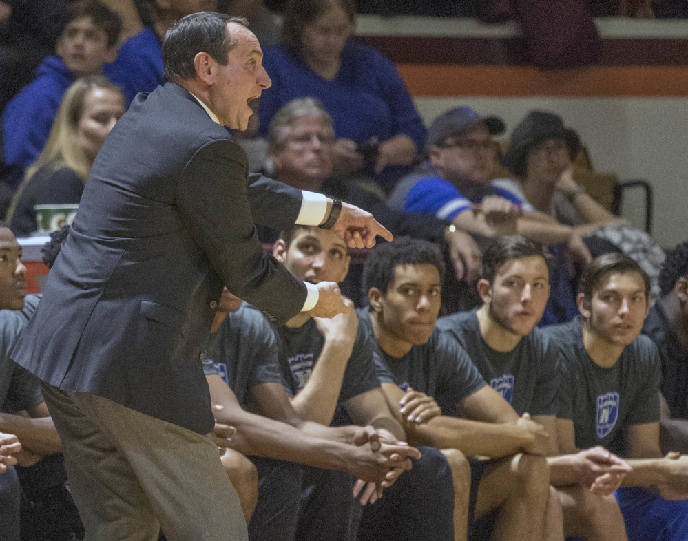 Duke head coach Mike Krzyzewski yells to his players during the first half of an NCAA college basketball game Saturday, Dec 31, 2016, at Cassell Coliseum in Blacksburg, Va. Tech won 89-75. (AP Photo/Don Petersen)
