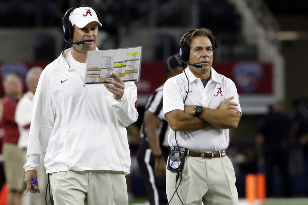 Offensive coordinator Lane Kiffin, left, and head coach Nick Saban weren't always on the same page for Alabama this season. Kiffin has left to be the Florida Atlantic head coach.
