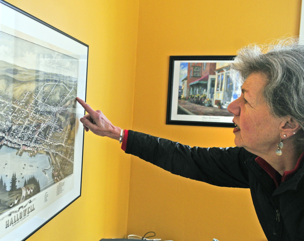 Patricia Connors, who opposes city investment in Stevens Commons, points out that part of the city on an 1875 map during an interview Friday in her Hallowell home.