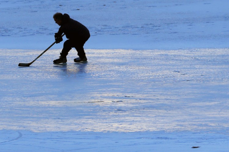 Bo Hewey of Portland practices Friday on Deering Oaks Pond for an upcoming hockey match in Rangeley. The city of Portland maintains several ponds ideal for ice skating.
