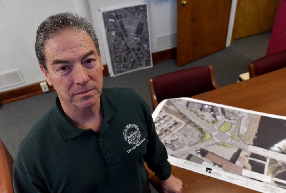 Waterville City Manager Mike Roy with a rendering of the proposed traffic plans. A decision on the proposal, part of a $4.4 million revitalization effort, is likely a year away.