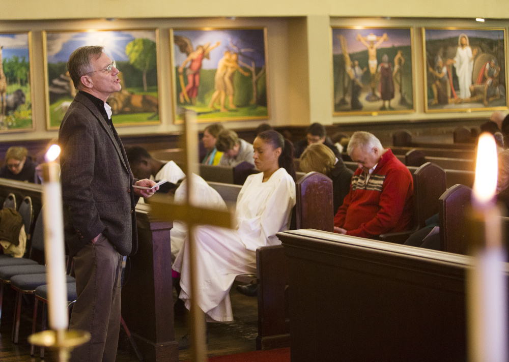 Pastor Don Drake leads Sunday service at Deering Center Community Church. "This church has been an integral part of the Deering Center community for more than 100 years now and this bell tower project will be a major challenge."
Carl D. Walsh/Staff Photographer