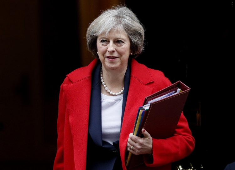 Britain's Prime Minister Theresa May says she will ask the House of Commons on Wednesday to back her election call.