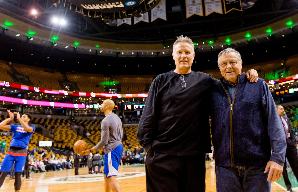Bob Brown of Scarborough, right, and his son, Brett, get together before Friday's game between the Celtics and 76ers at TD Garden. 