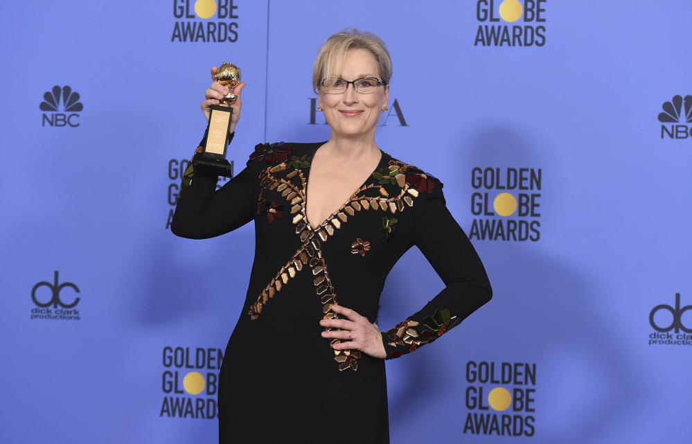 Meryl Streep poses in the press room with the Cecil B. DeMille award at the 74th annual Golden Globe Awards at the Beverly Hilton Hotel on Sunday, Jan. 8, 2017, in Beverly Hills, Calif.