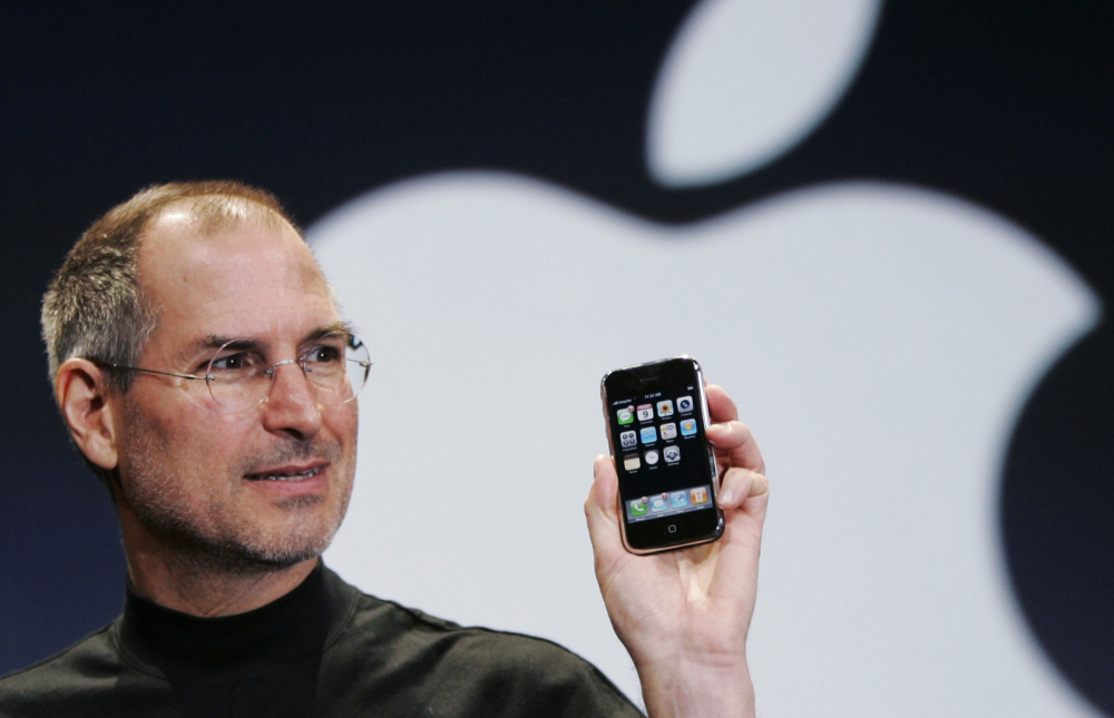On Jan. 9, 2007, Apple CEO Steve Jobs holds the first version of the iPhone at the MacWorld Conference in San Francisco. He correctly called it 'a revolutionary product.'