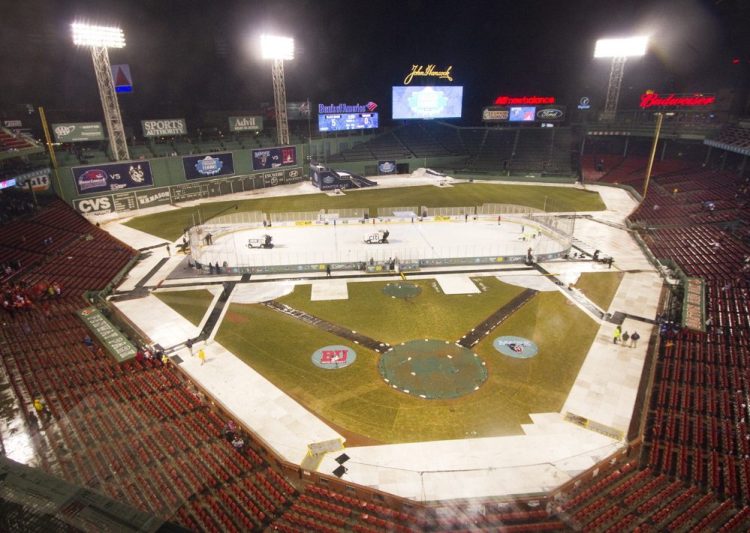 Outdoor hockey has become more common, but a venue like Fenway Park, seen setting up for a college game on Jan. 11, 2014, still makes for an exciting event worth continuing.