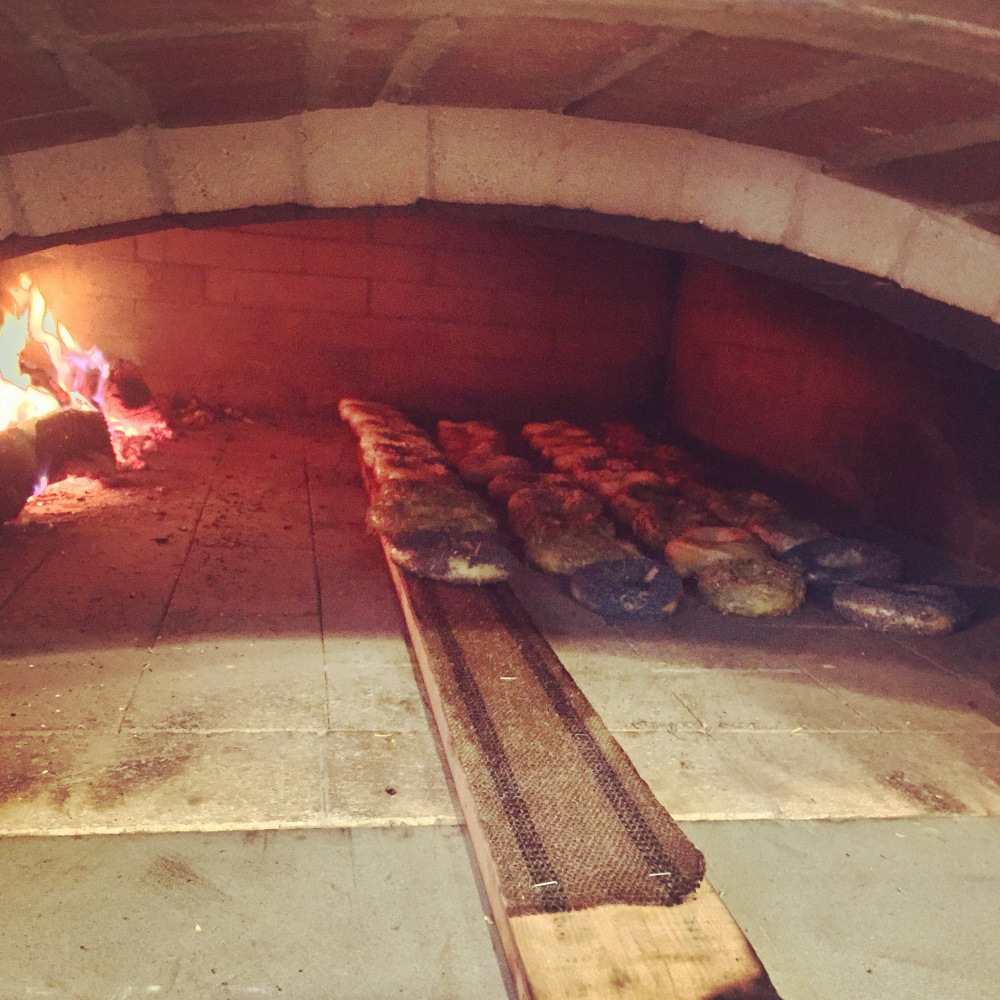 Bagels in the wood-fired oven at The Purple House in North Yarmouth.