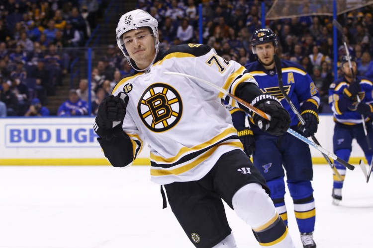 Boston Bruins' Frank Vatrano celebrates after scoring a goal as St. Louis Blues' Alexander Steen skates nearby during the first period Tuesday in St. Louis. 