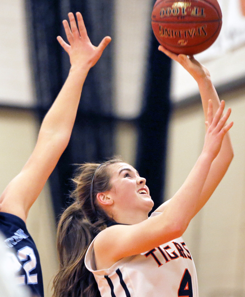 Biddeford freshman Grace Martin goes for a layup late in the game as the Tigers attempted to gain ground against the Blue Blazes. Westbrook held on and improved its record to 3-6. Biddeford dropped to 1-8.