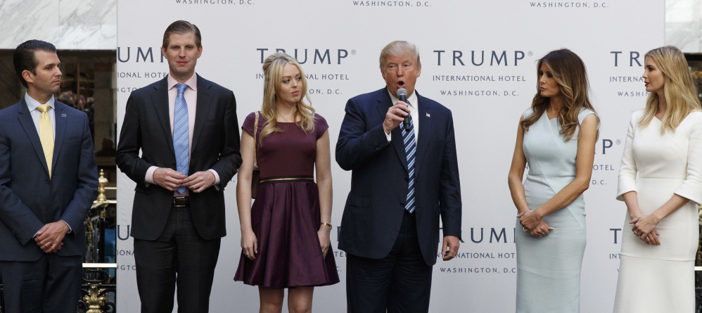 The Trump family opens their hotel in Washington in October, in a space they have leased from the federal government.  From left, Donald Trump Jr., Eric Trump, Donald Trump, Melania Trump, Tiffany Trump and Ivanka Trump.