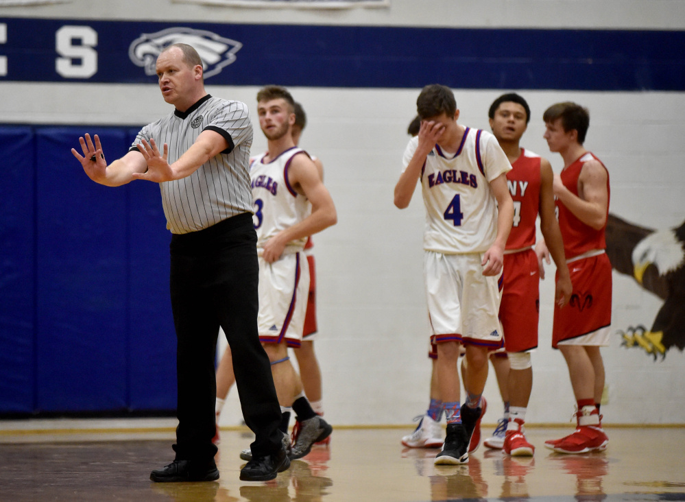 Randy Caswell officiates a game between Cony High School and Messalonskee High School Saturday in Oakland.