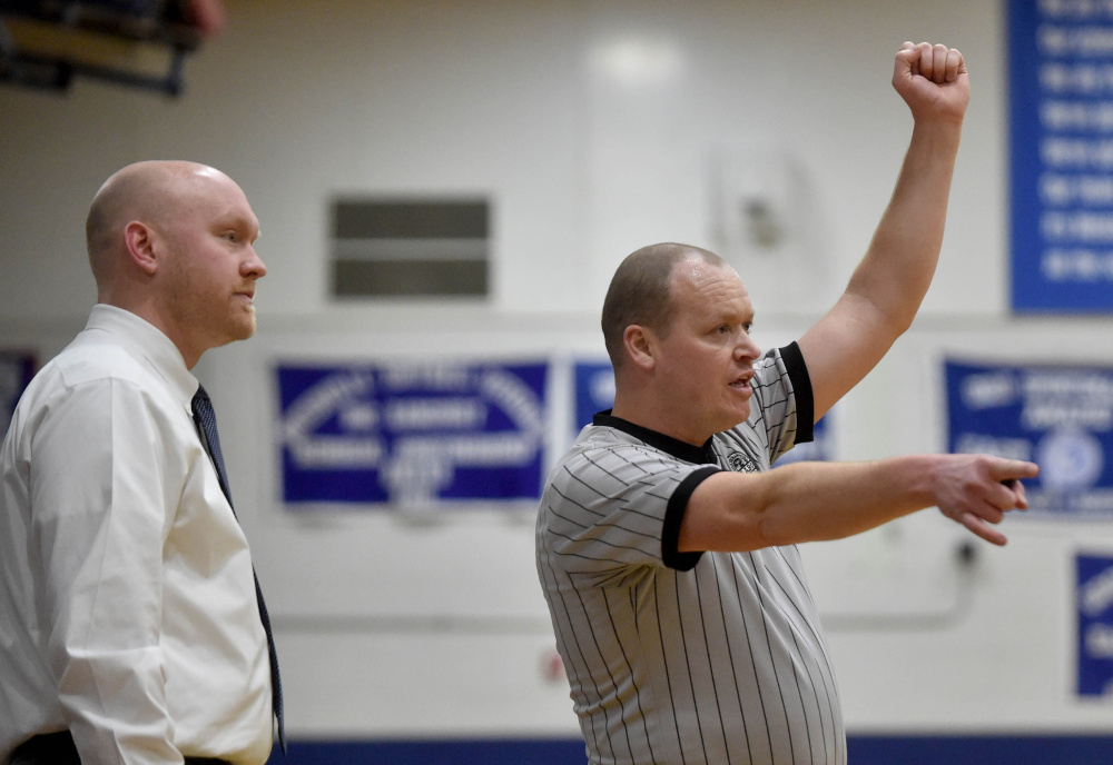 Randy Caswell officiates a game between Cony High School and Messalonskee High School on Saturday in Oakland.