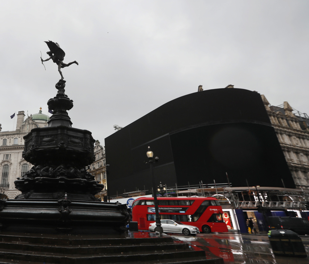 The electronic signboard at Piccadilly Circus, the iconic space in central London, was turned off Monday as part of a monthslong renovation. When the board is back online this fall, one giant screen will replace the six currently used for advertisements.