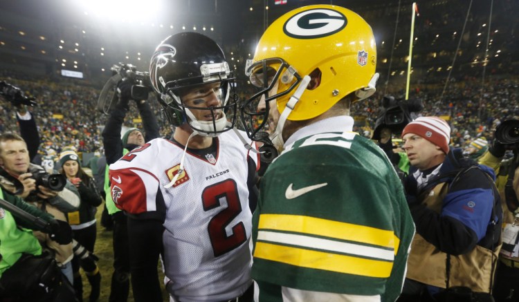 Two of the hottest quarterbacks in the NFL, Matt Ryan of the Falcons, left, and Aaron Rodgers of the Packers will meet Sunday in the NFC championship game. Plenty of points are expected.