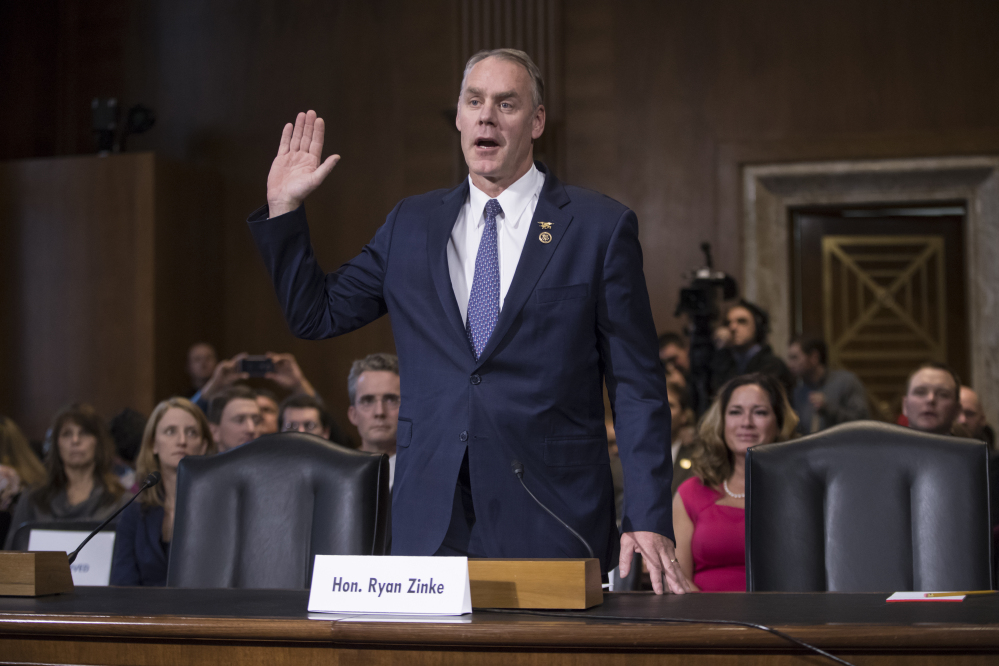 Interior Secretary-designate, Rep. Ryan Zinke, R-Mont., is sworn in on Capitol Hill in Washington on Jan. 17, prior to testifying at his confirmation hearing before the Senate Energy and Natural Resources Committee. 
