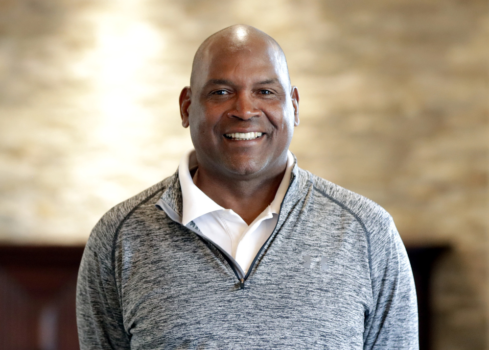 Tim Raines poses for a photograph shortly after being elected to baseball's Hall of Fame on Wednesday. Raines, fifth in career stolen bases, was a seven-time All-Star and the 1986 NL batting champion. He spent 13 of 23 big league seasons with the Montreal Expos and joins Andre Dawson and Gary Carter as the only players to enter the Hall representing the Expos. Raines was elected with 86 percent of the vote. Jeff Bagwell and Ivan Rodriguez were also selected.