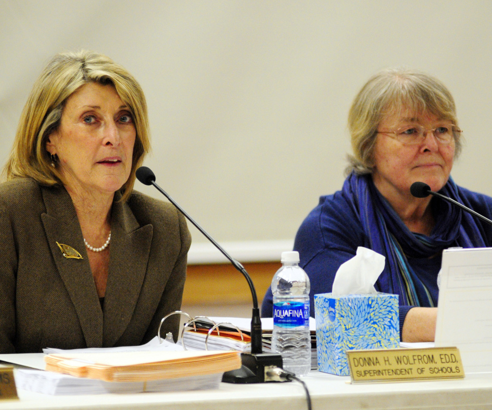 Superintendent Donna Wolfrom, left, speaks Wednesday beside board Chairwoman Terri Watson during an RSU 38 board meeting where parents and teachers expressed concern about mold at Manchester Elementary School.