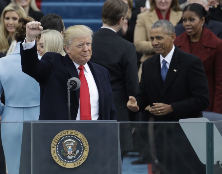 President Donald Trump waves after being sworn in as the 45th president of the United States during the 58th Presidential Inauguration at the U.S. Capitol in Washington on Friday.