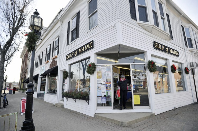 A customer leaves Gulf of Maine Books in Brunswick Tuesday. The shop, described as a utopia of progressive ideas,has helped owner Gary Lawless make a difference in the lives of many Mainers.
