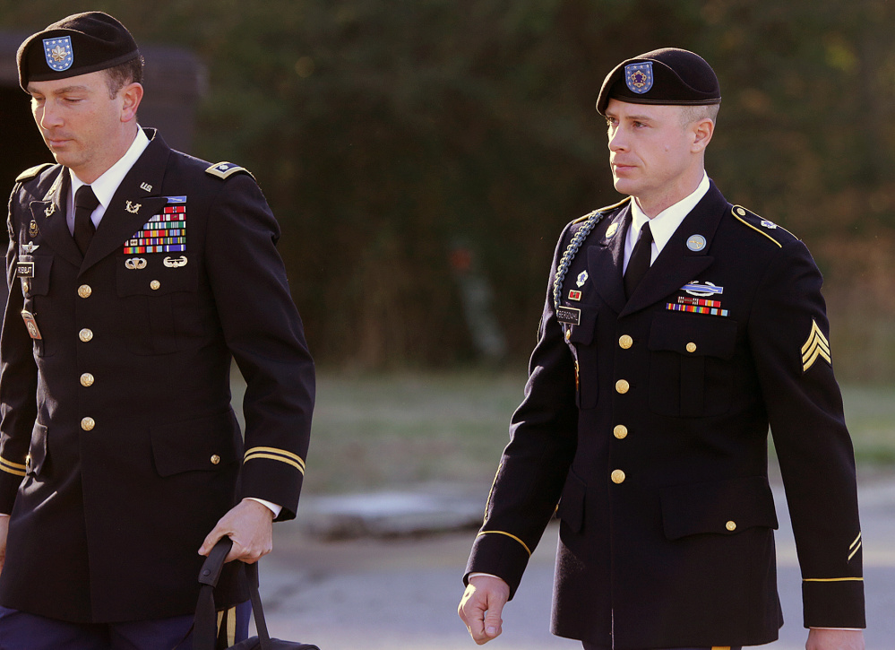Army Sgt. Bowe Bergdahl, right, who was held by the Taliban for five years, arrives for a pretrial hearing at Fort Bragg, N.C., with his defense counsel, Lt. Col. Franklin D. Rosenblatt, in 2016.