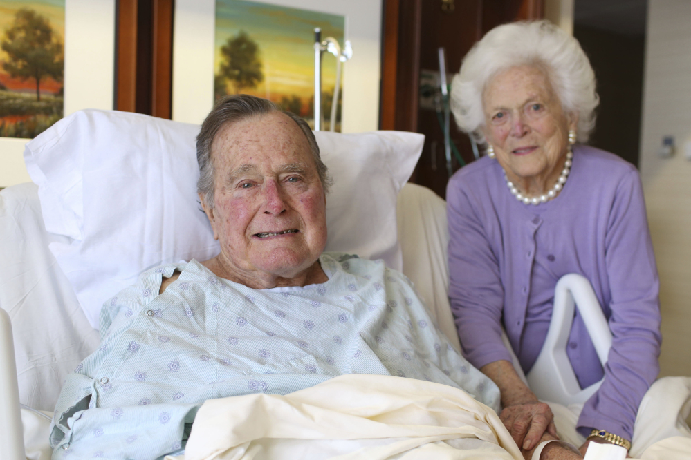 Former President George H.W. Bush and his wife Barbara pose for a photo at Houston Methodist Hospital in Houston in a photo provided Monday.