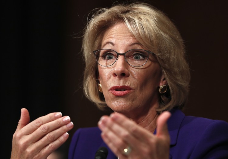 President Trump's nominee for education secretary, Betsy DeVos, testifies on Capitol Hill in January at her confirmation hearing before the Senate Health, Education, Labor and Pensions Committee. 