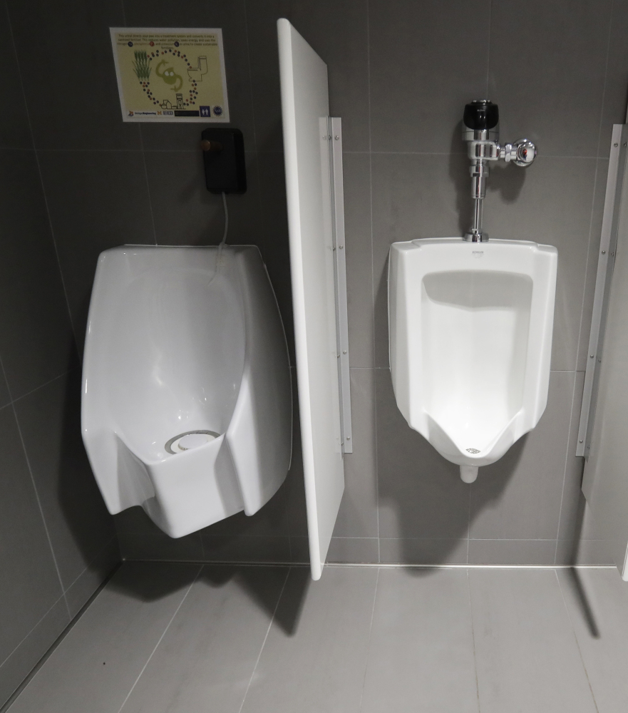 The University of Michigan in Ann Arbor offers both a waterless urinal, left, and a standard urinal.