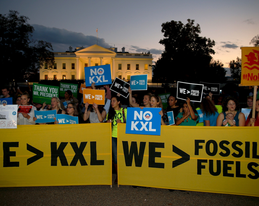 Activists celebrate the Obama administration's rejection of the Keystone XL pipeline in 2015. President Trump seeks to reverse this.