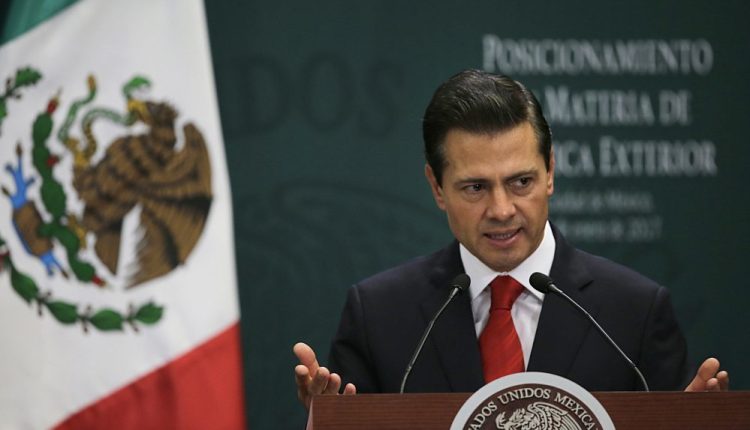 Mexico's President Enrique Pena Nieto, shown speaking in Mexico City on Monday, tweeted Thursday that he won't attend a meeting with President Trump.