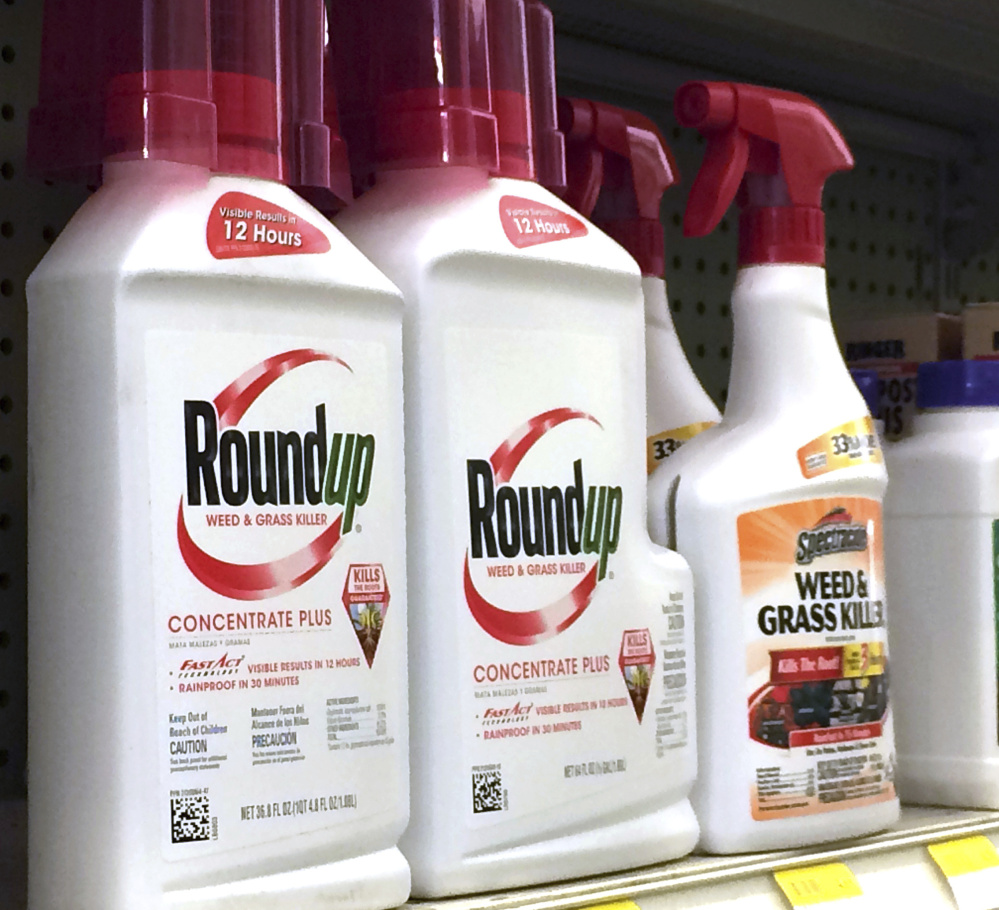 Containers of weed killer Roundup sit on a shelf at a hardware store in Los Angeles on Thursday.