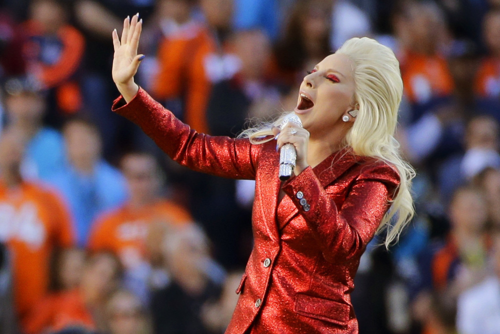 Lady Gaga sings the national anthem before Super Bowl 50 in Santa Clara, Calif. Lady Gaga is reportedly planning an unconfirmed stunt during Super Bowl 51 by performing from the roof of the stadium during the big game.