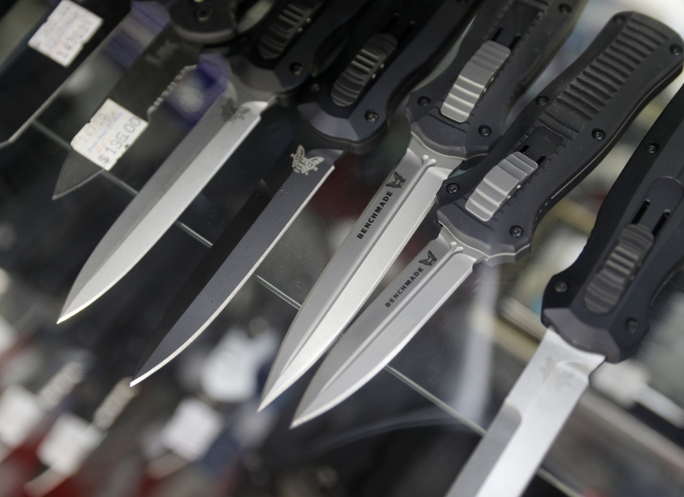 Automatic knives are shown at Bonds House of Cutlery/Knives & More in Las Vegas. A Colorado bill would remove switchblades from a list of outlawed weapons.
Associated Press/John Locher