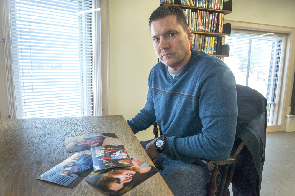 Amber Morrow’s father, Andrew Morrow, with photographs of his daughter and other family members. Morrow’s mother, Jen Morrow, said that she knew her daughter was transgender when she was only a child.