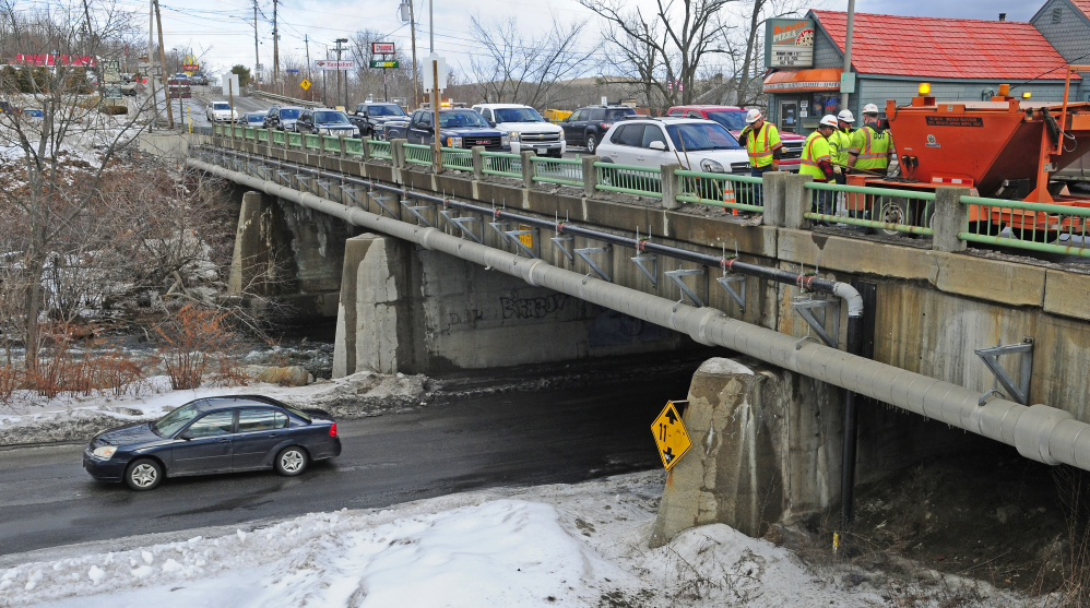 The Bridge Street Bridge over Cobbosseecontee Stream in Gardiner, above, and the Maine Avenue Bridge, below, are on deck for upgrades. As they prepare for the road work, officials are considering the routes that pedestrians might take.